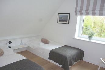 Ein weiteres Schlafzimmer mit zwei Einzelbetten (je 90 x 200 cm) ldt zu herrlichen Trumen ein!