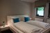 'Das groe Doppelbett 180x200cm im Schlafzimmer...'