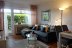'Das Wohnzimmer, mit gemtlicher Couch in modernen Farben...'