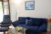'Die gemtliche Couch und der Relaxsessel. Die Couch lsst sich als Ausweichschlafplatz umfunktionieren.'