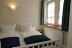'Das Schlafzimmer mit groem Doppelbett (180x200)'