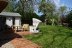 'Die Terrasse hinter dem Haus mit dem Garten - nur fr Sie zu nutzen. Der Austritt auf die Terrasse befindet sich im Essbereich'