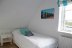 'Weiterhin liegt hier das gemtliche Schlafzimmer fr 1-2 Personen mit Stapelbett je Einzelbett (80 x 200 cm).'