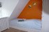 'Gemtliches Schlafzimmer mit zwei Kojenbetten (je 90 x 200 cm). Es kann in einem der Schlafzimmer ein Kinderreisebettchen dazu gestellt werden.'