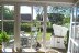 'Die Terrasse mit Strandkorb und Gartenmbeln ldt zum Verweilen ein.'