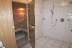 'Weiterhin befindet sich im Souterrain die Sauna mit Dusche, ein Abstellraum und ein Hauswirtschaftsraum mit Waschmaschine und Trockner zur kostenfreien Nutzung.'