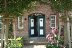 'Der einladende Eingang des Hauses Eulenluke im Taarepswoi 17b in Borgsum auf Fhr'