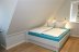 'Das zweite Schlafzimmer mit Doppelbett, Bettmaa 140x200cm, Schrank + TV Gert\nVerdunkelungsmglichkeit'